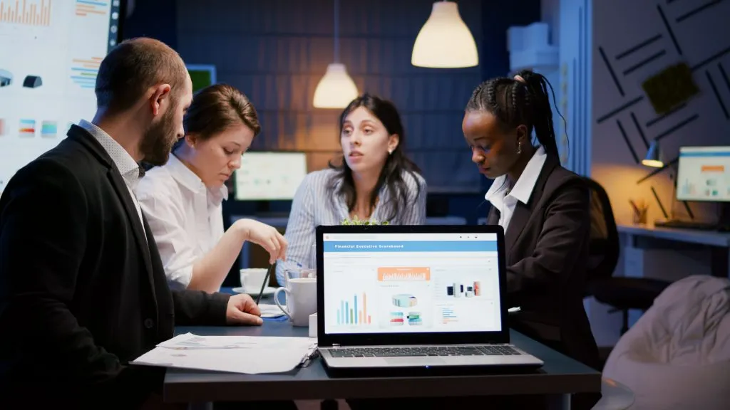 People at their office, doing adosciussion something regarding their business.