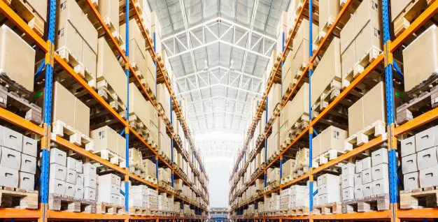 "Rows of shelves with boxes in modern warehouse Premium Photo"