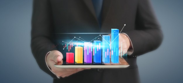 Business plan graph growth and increase of chart positive indicators in his business, tablet in hand Premium Photo"
