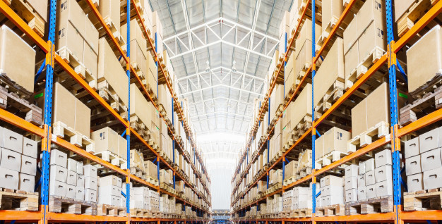 "Rows of shelves with boxes in modern warehouse Premium Photo"