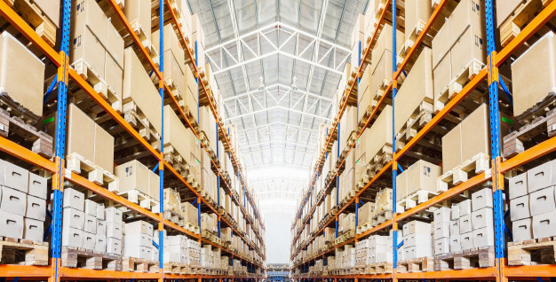 "Rows of shelves with boxes in modern warehouse Premium Photo"